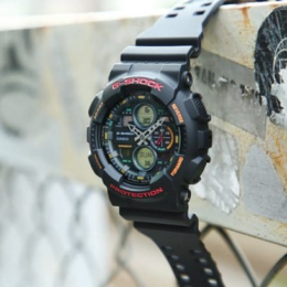 Relógio Casio G-Shock GA-140-1A4 em resina preta com detalhes vermelho-alaranjados e mostrador analógico-digital